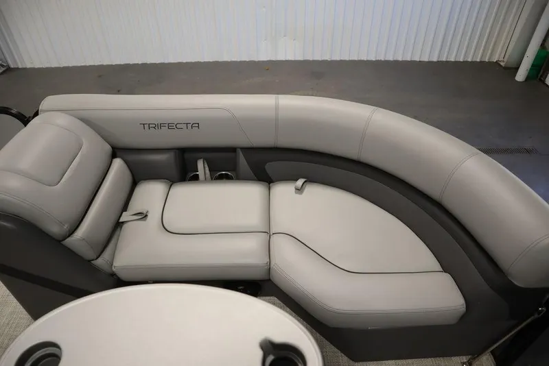 Slide: The Image of 2023 Trifecta 24UL CS 2.75 boat with luxurious gray seating. - 16