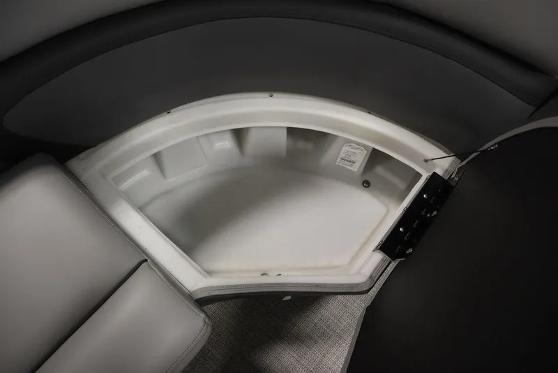 Slide: The Image of 2023 Trifecta 24UL CS 2.75 boat storage compartment with cushioned seating. - 18
