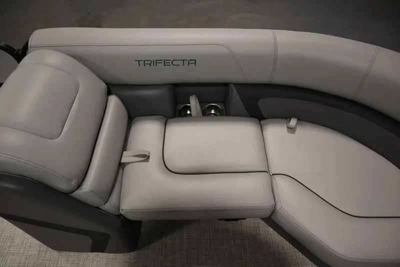 Slide: The Image of 2023 Trifecta 24UL CS 2.75 boat interior with luxurious gray seating. - 19