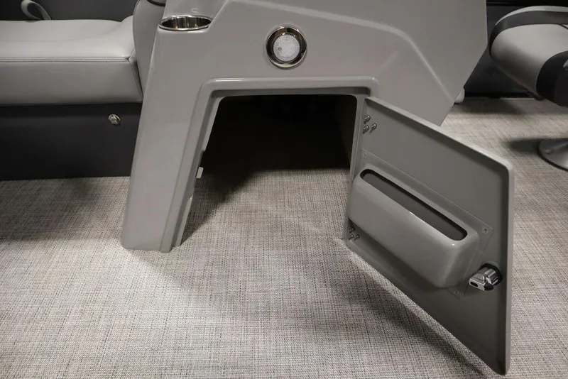 Slide: The Image of 2023 Trifecta 24UL CS 2.75 storage compartment with open door. - 26