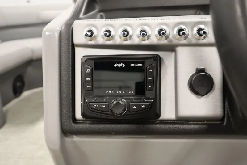 Slide: The Image of 2023 Trifecta 24UL CS 2.75 boat dashboard with Wet Sounds audio system. - 32
