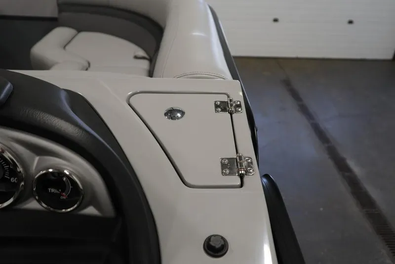 Slide: The Image of Close-up of 2023 Trifecta 24UL CS 2.75 boat interior, showing dashboard and seating. - 34