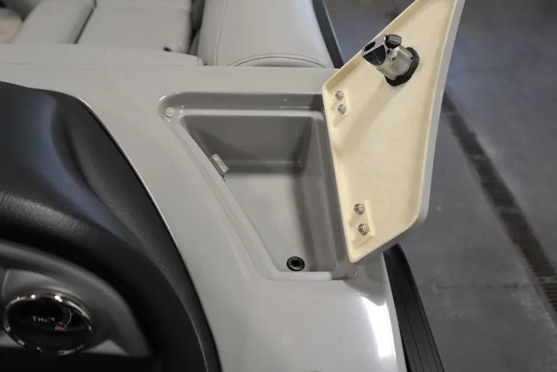 Slide: The Image of 2023 Trifecta 24UL CS 2.75 boat storage compartment with open lid. - 35