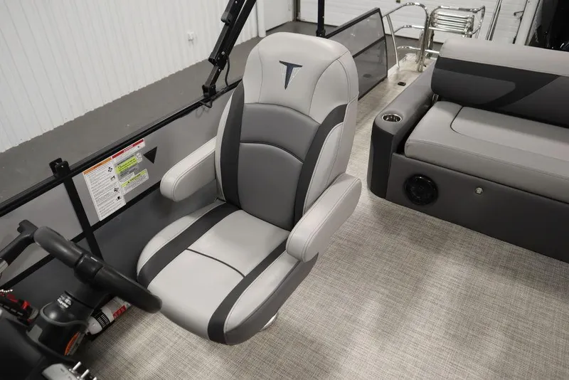 Slide: The Image of Captain's chair on 2023 Trifecta 24UL CS 2.75 pontoon boat, gray and black upholstery. - 39