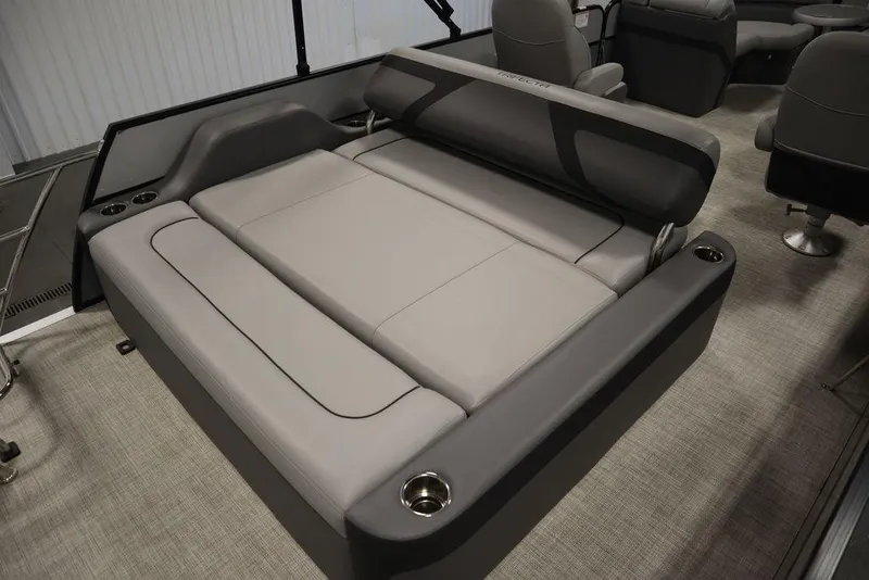 Slide: The Image of 2023 Trifecta 24UL CS 2.75 pontoon boat interior with gray seating. - 43