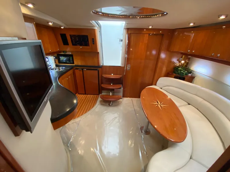 Slide: The Image of Luxurious interior of 2005 Regal Commodore 4260 yacht with modern amenities. - 12