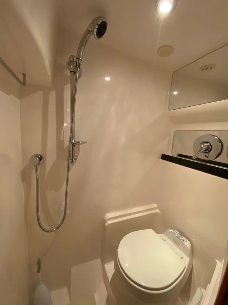 Slide: The Image of 2005 Regal Commodore 4260 yacht bathroom with shower and toilet - 17