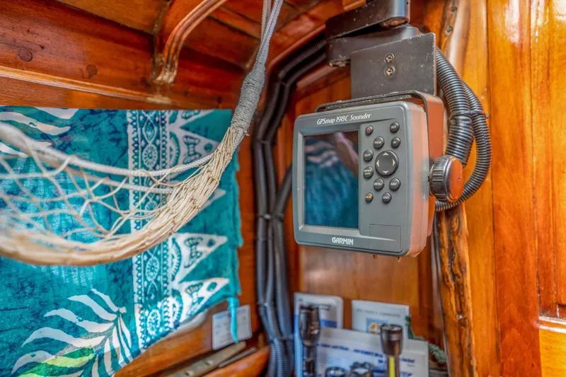 Slide: The Image of GPS device inside a 1950 Custom Cornu Sloop boat cabin. - 23