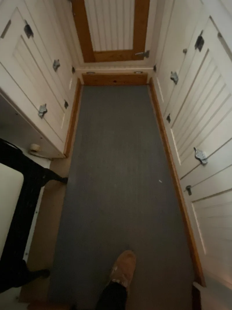 Slide: The Image of Lower Storage Cabinets in Galley - 47