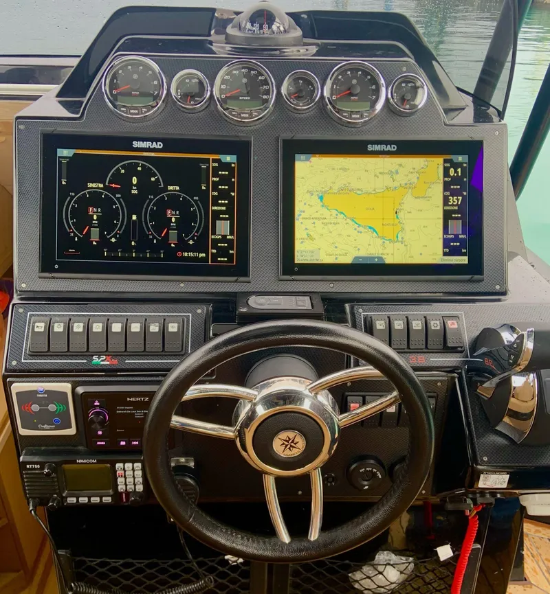 Slide: The Image of 2025 SPX RIB 38 Sport boat dashboard with advanced navigation and control systems. - 18