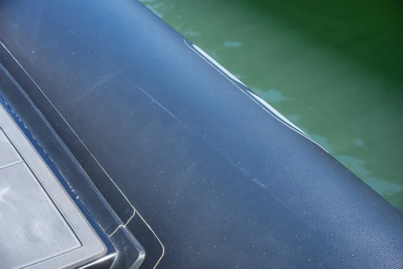 Slide: The Image of Close-up of Sea Prop COMFORT 33 boat's deck and side, 2025 model. - 16