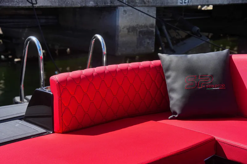 Slide: The Image of Red seating on Sea Prop COMFORT 33 boat, 2025 model, with black cushion. - 26