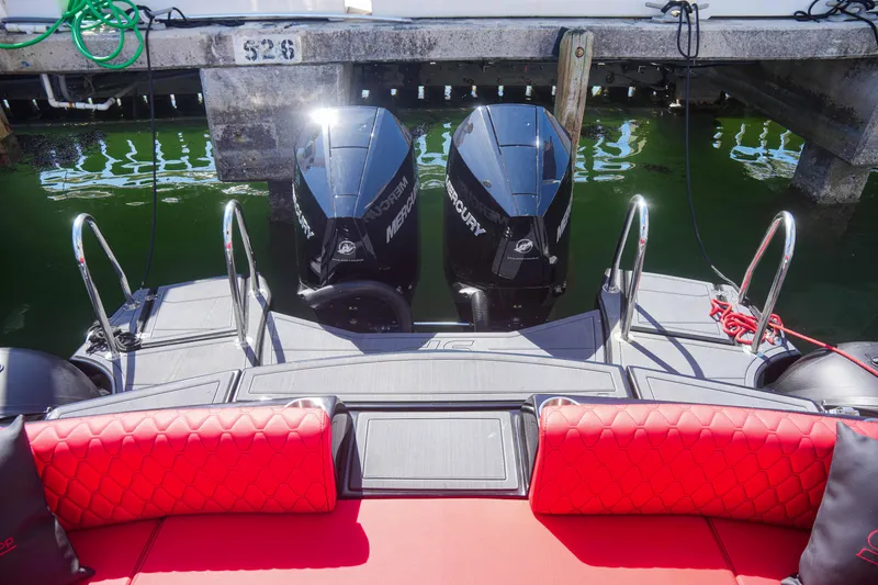 Slide: The Image of 2025 Sea Prop COMFORT 33 boat with twin Mercury outboard engines docked. - 9