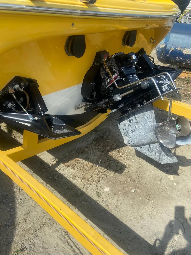 Slide: The Image of 2001 Baja H2X boat stern with outboard motor and propeller. - 28