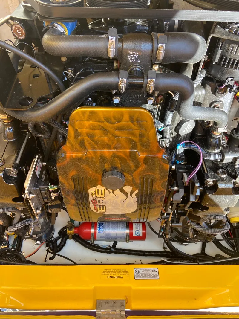 Slide: The Image of 2001 Baja H2X engine compartment with fire extinguisher and custom components. - 31