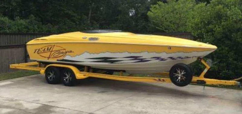 Slide: The Image of 2001 Baja H2X speedboat in yellow on a matching trailer. - 4