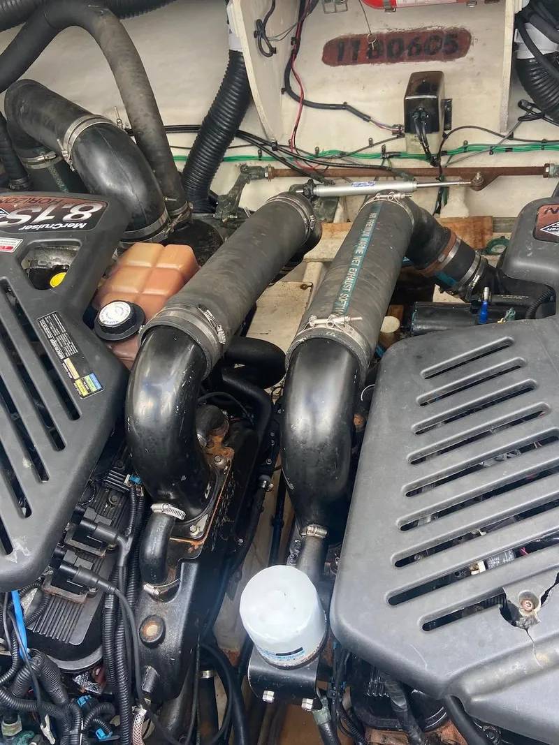 Slide: The Image of 2006 Sea Ray 340 Sundancer engine compartment with twin V8 engines. - 31