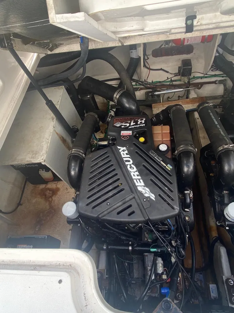 Slide: The Image of 2006 Sea Ray 340 Sundancer engine compartment with Mercury 8.1L engine. - 39
