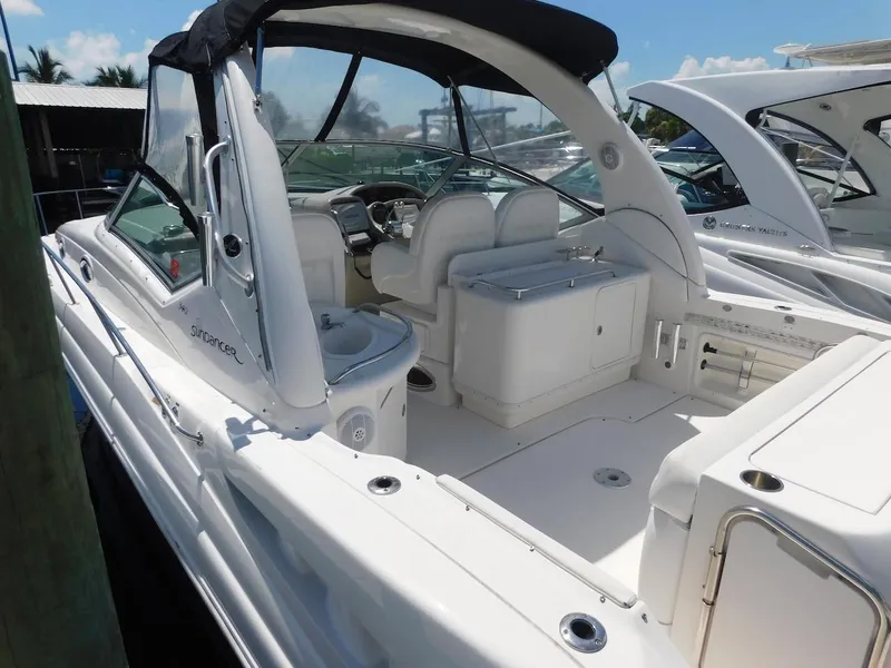 Slide: The Image of 2006 Sea Ray 340 Sundancer boat with spacious cockpit and seating area. - 4