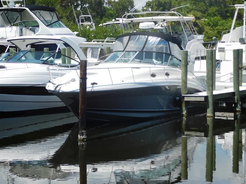 Slide: The Image of 2006 Sea Ray 340 Sundancer docked at a marina. - 40