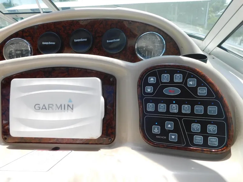 Slide: The Image of Control panel of a 2006 Sea Ray 340 Sundancer with Garmin navigation system. - 8
