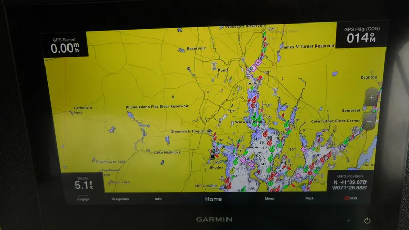 Slide: The Image of Garmin GPS display on a 2002 Sea Ray 380 Sundancer, showing a detailed nautical map. - 29