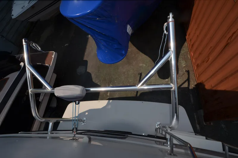 Slide: The Image of 1991 Carver 33 Aft Cabin boat deck with metal railing, overhead view. - 4