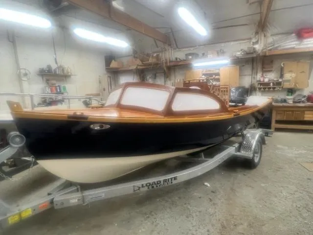 The Image of Custom 2021 boat model 17 on Load Rite trailer in workshop. - 1