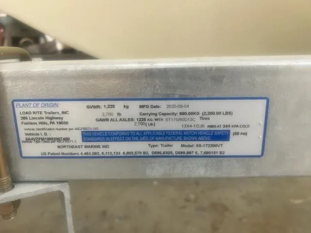 Slide: The Image of Custom 17 Custom 2021 trailer label with specifications and compliance details. - 8