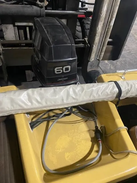 Slide: The Image of 1977 Yarcraft Spirit of 76 boat with Johnson 60 outboard motor. - 12