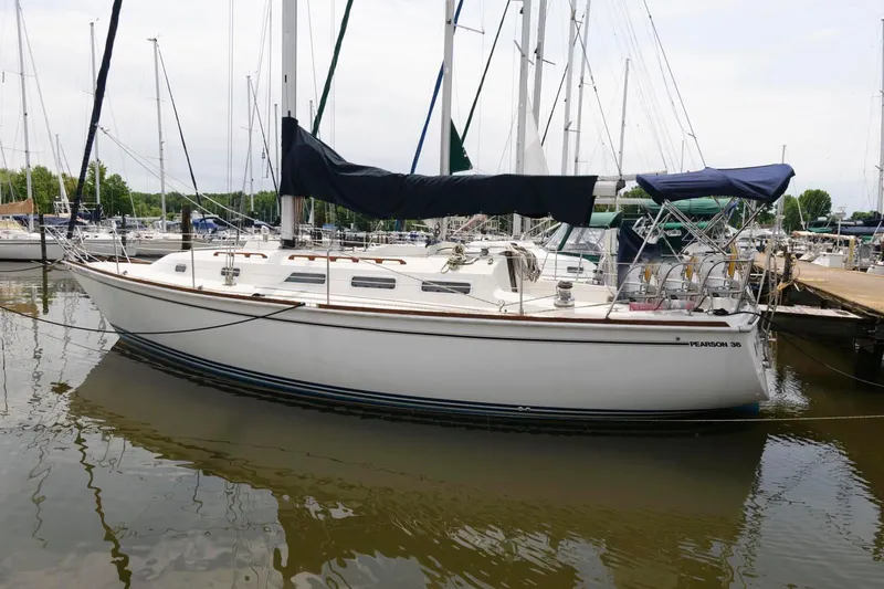 The Image of 1987 Pearson 36-2 sailboat docked in a marina. - 0