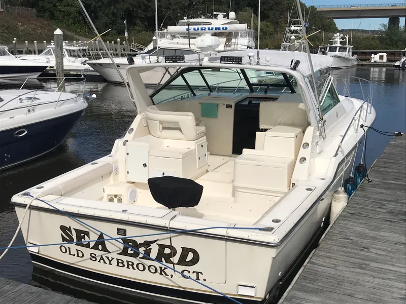 Slide: The Image of 1997 Tiara Yachts 3700 Open docked, featuring spacious deck and seating, Old Saybrook, CT. - 2