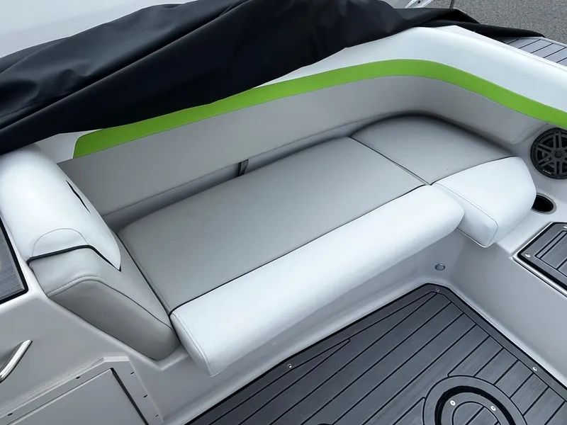 Slide: The Image of 2024 Starcraft SVX 191 boat interior seating with green accent. - 10