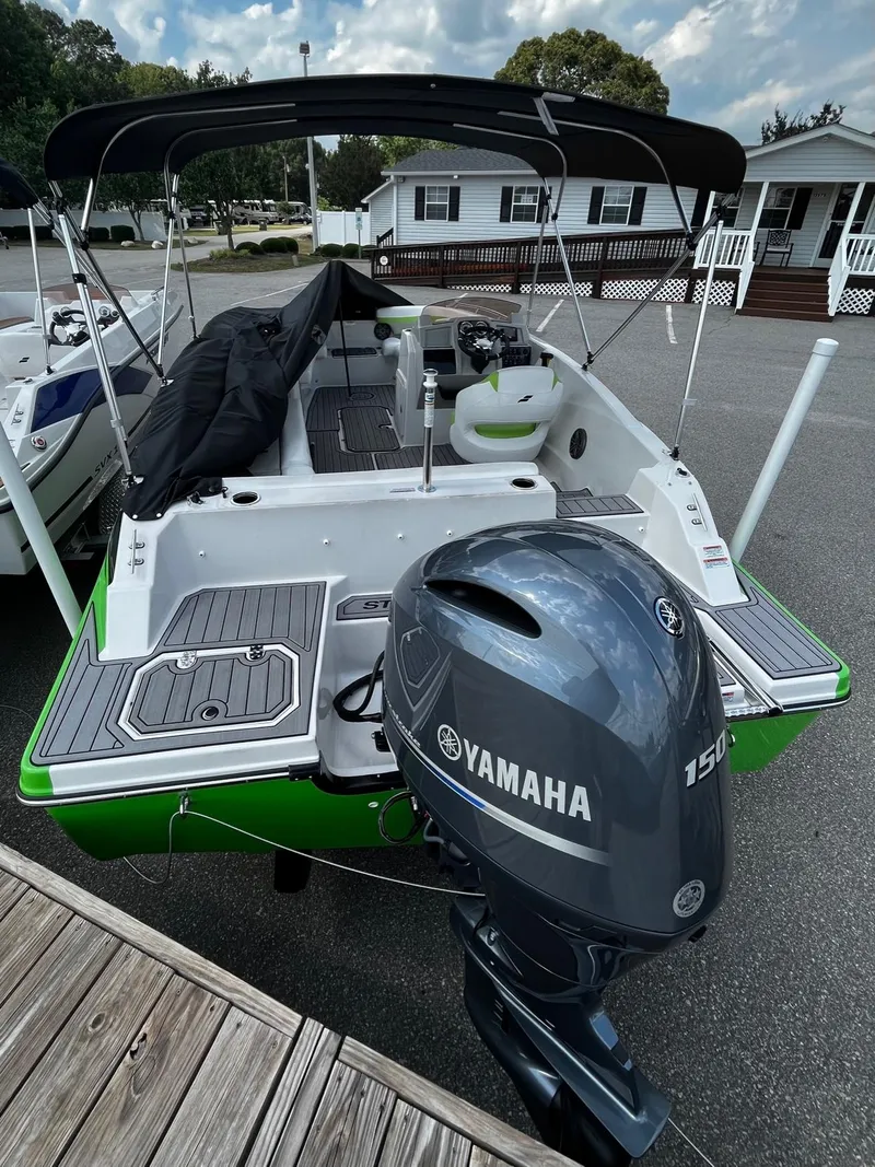 Slide: The Image of 2024 Starcraft SVX 191 boat with Yamaha 150 outboard motor at dock. - 4