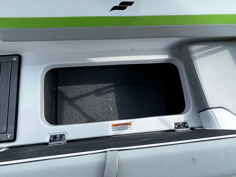 Slide: The Image of 2024 Starcraft SVX 191 boat storage compartment with open hatch. - 6