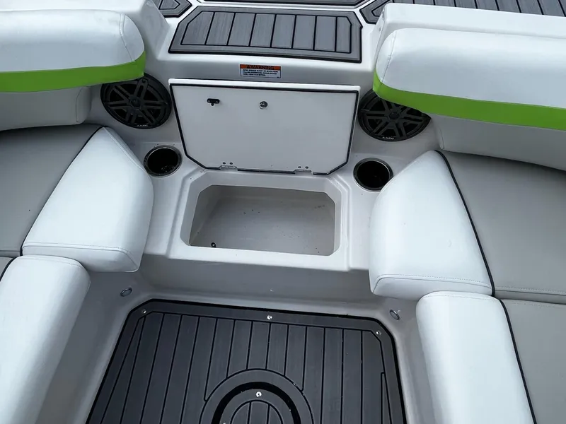 Slide: The Image of 2024 Starcraft SVX 191 boat interior with seating and storage compartments. - 8