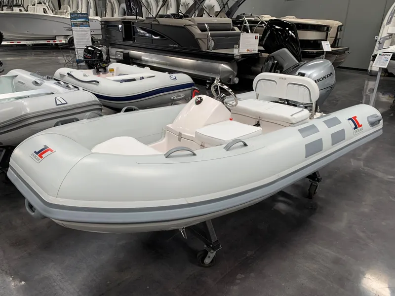 The Image of 2023 Inmar 320R-YS inflatable boat on display in showroom. - 1