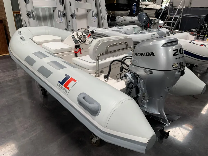 Slide: The Image of 2023 Inmar 320R-YS inflatable boat with Honda 20 HP outboard motor. - 3