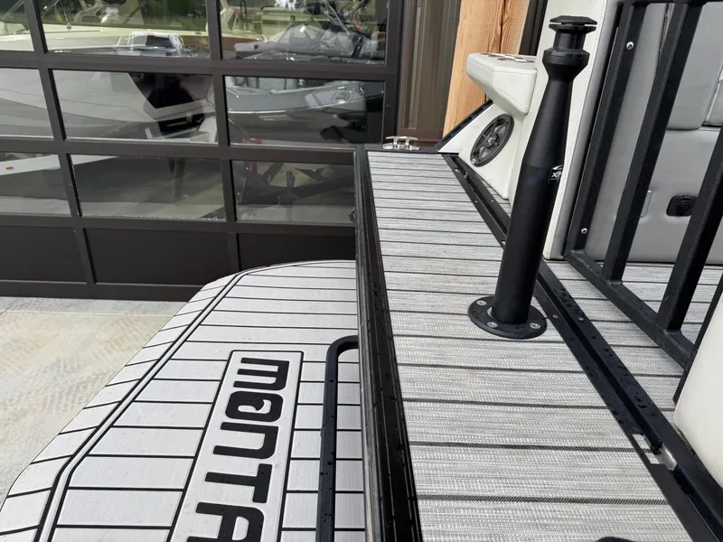 Slide: The Image of 2022 Montara SURF BOSS 25 boat deck with sleek design and modern features. - 12