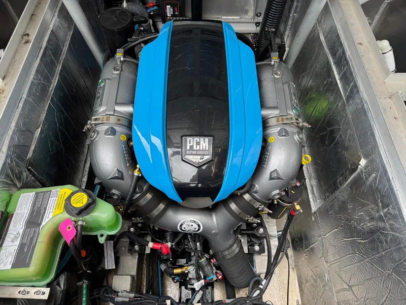 Slide: The Image of Engine compartment of 2022 Montara SURF BOSS 25 with PCM marine engine. - 17