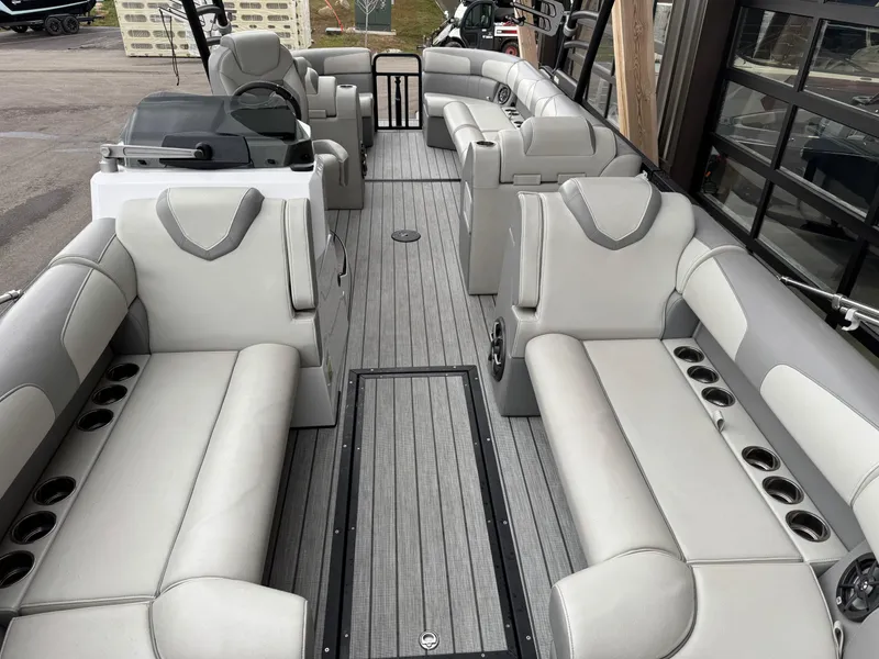 Slide: The Image of 2022 Montara SURF BOSS 25 boat interior with spacious seating and modern design. - 6