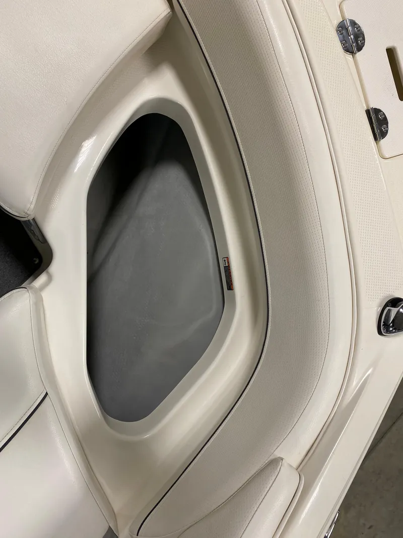 Slide: The Image of Interior storage compartment of a 2011 Bayliner 197 boat. - 17