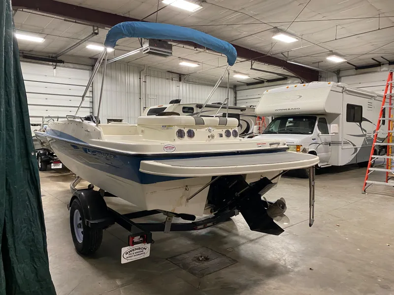 Slide: The Image of 2011 Bayliner 197 boat in indoor storage facility. - 2