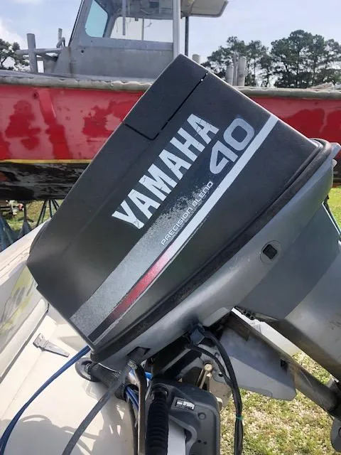 Slide: The Image of 1995 Novurania Tender with Yamaha 40 outboard motor. - 8