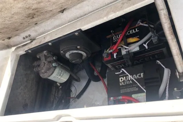 Slide: The Image of Battery compartment of a 1995 Novurania Tender with Duracell Ultra batteries and wiring. - 9