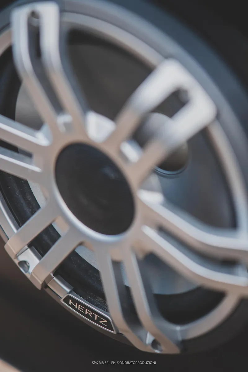 Slide: The Image of Close-up of a Hertz speaker in a 2025 SPX RIB 32 Dinette. - 24