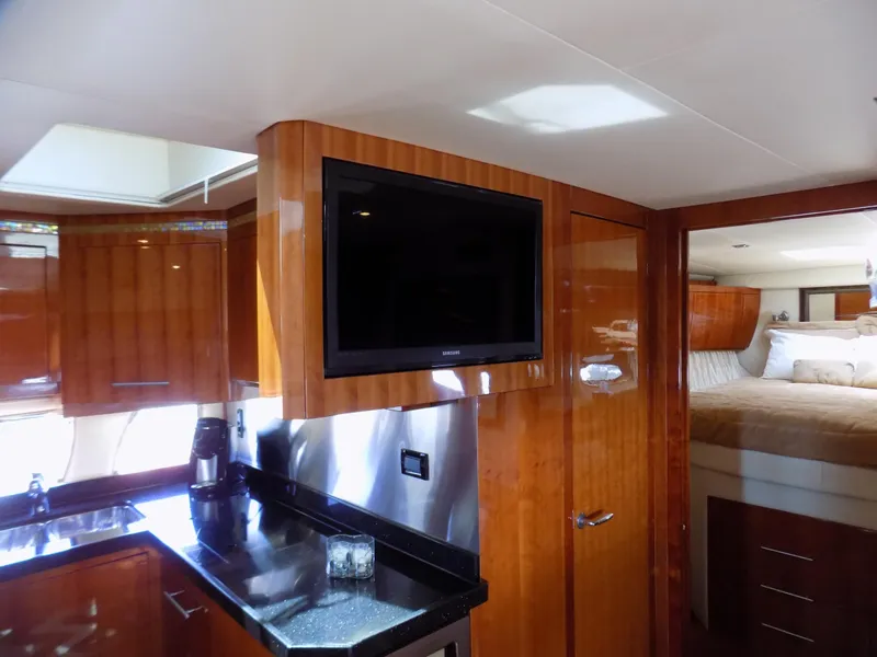 Slide: The Image of Luxurious interior of 2012 Regal 52 Sport Coupe yacht with modern amenities. - 14