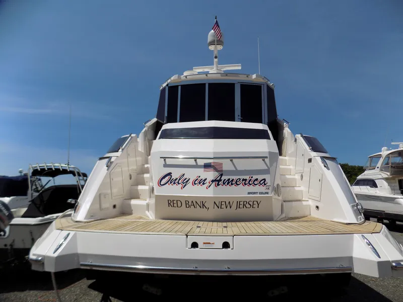 Slide: The Image of 2012 Regal 52 Sport Coupe yacht docked, featuring "Only in America" and "Red Bank, New Jersey" text. - 6