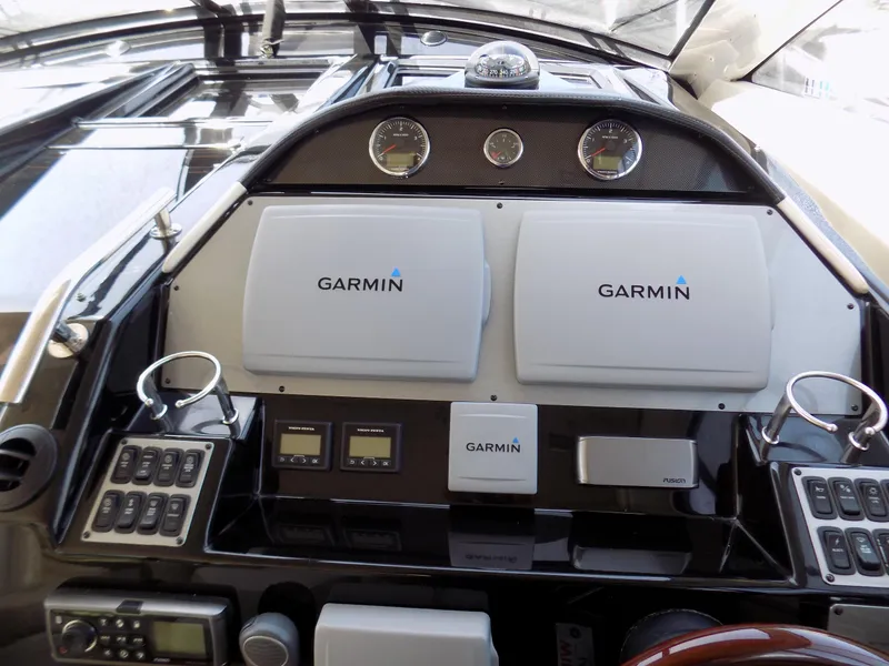 Slide: The Image of Control panel of a 2012 Regal 52 Sport Coupe with Garmin navigation systems. - 8