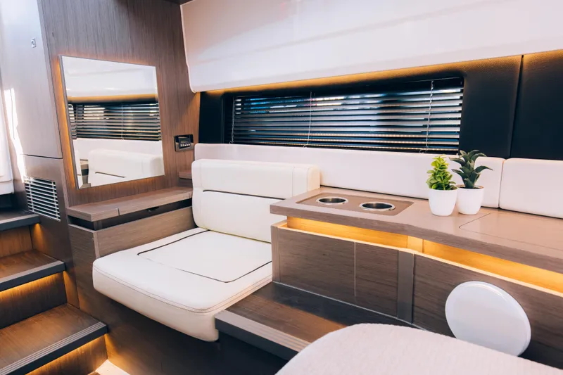 Slide: The Image of Luxurious interior of the 2024 Wellcraft 355 boat with modern seating and decor. - 7